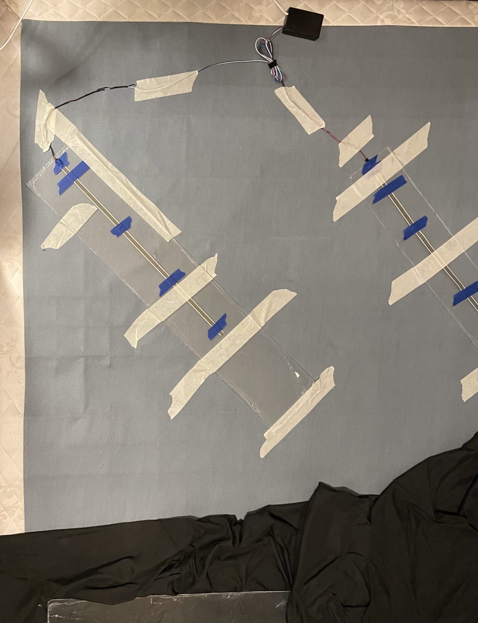Photo of bed sensor placement on box spring.